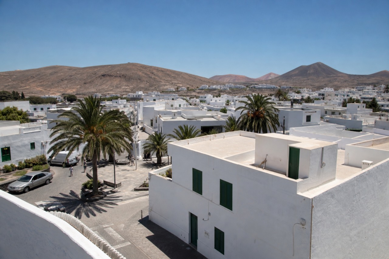 White low-rise Canarian town under a clear sky