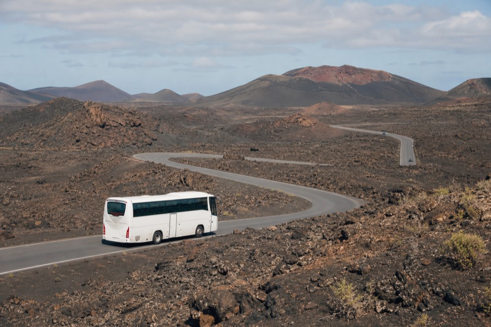 Timanfaya lava fields with coach on the Ruta de los Volcanes